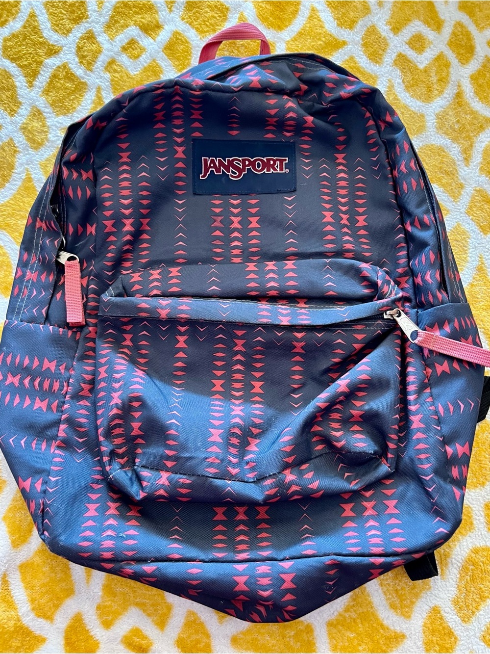 Jansport Black Backpack with Red Geometric Print